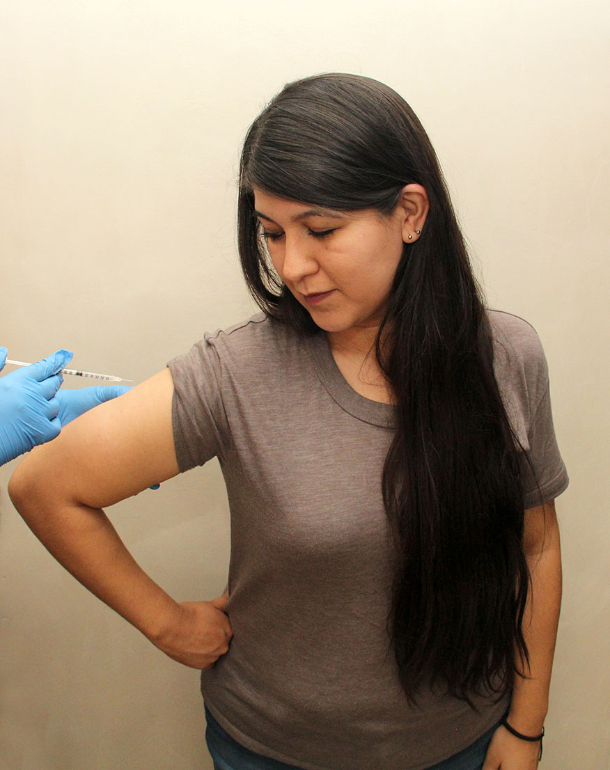 Woman getting a vaccination